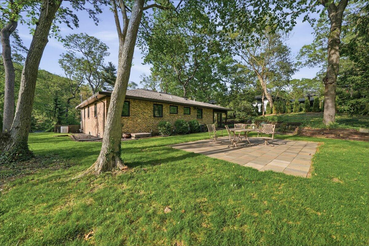 63 Ski Hill Road Portage, IN 46368 - Photo 28 of 28 a view of a house with yard and tree s