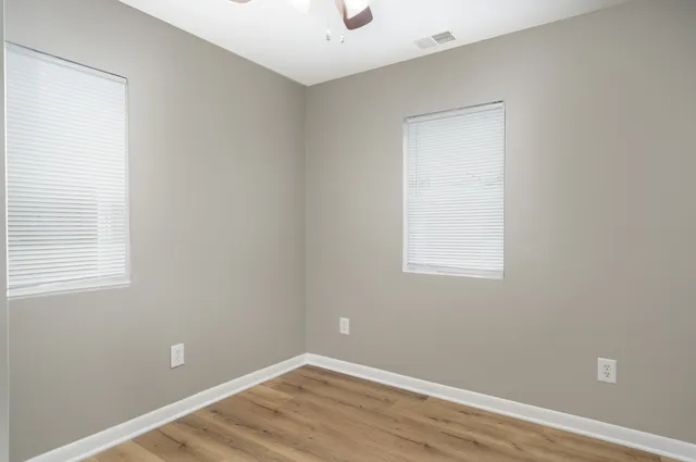 a view of a room that has a window in it