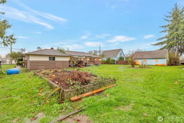 a front view of house with garden