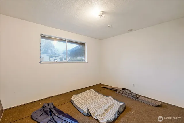 a kitchen with a sink stove and refrigerator