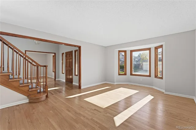 a view of a hallway with a fireplace