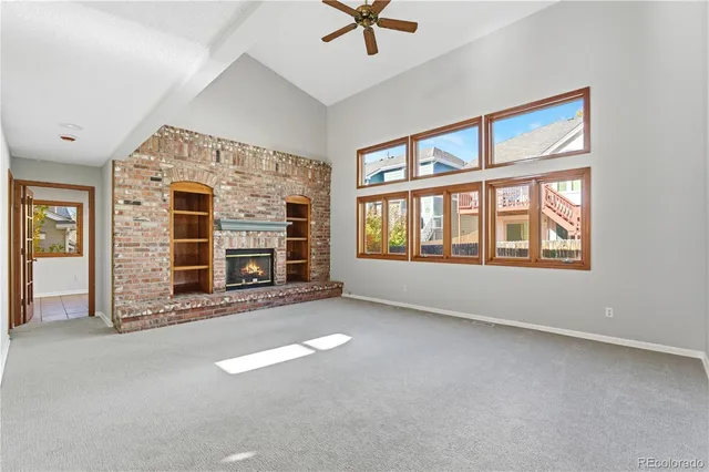 a view of empty room with windows