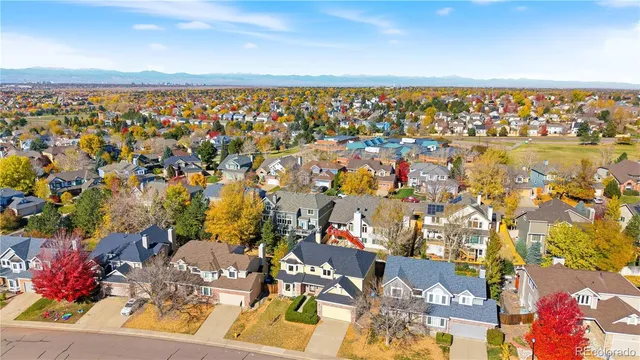 a picture of a bathroom with a white wall and a picture