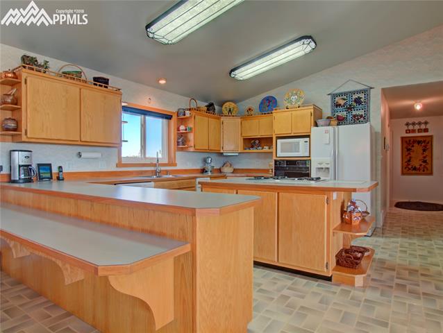 6890 Rio Road Peyton, CO 80831 - Photo 8 of 26 Great kitchen with tons of counter space