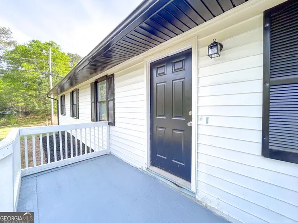 a view of a house with a deck