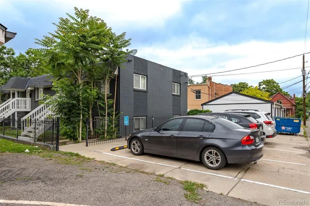 a car parked in front of a house