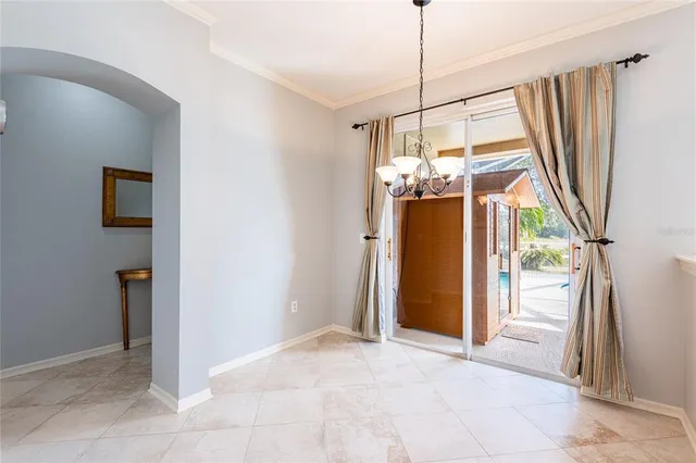 a view of a kitchen with sink and washing machine