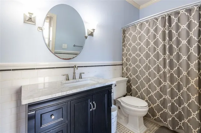 a view of a backyard with a swimming pool