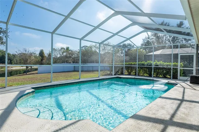 a view of a house with a swimming pool