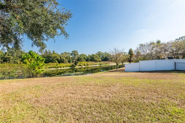 an aerial view of residential house with outdoor space