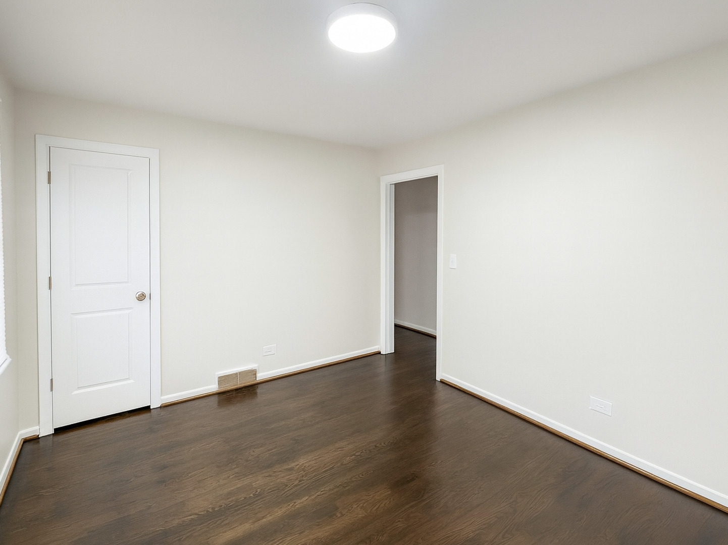 37684 North Sheridan Road Beach Park, IL 60087 - Photo 11 of 27 an empty room with wooden floor & windows