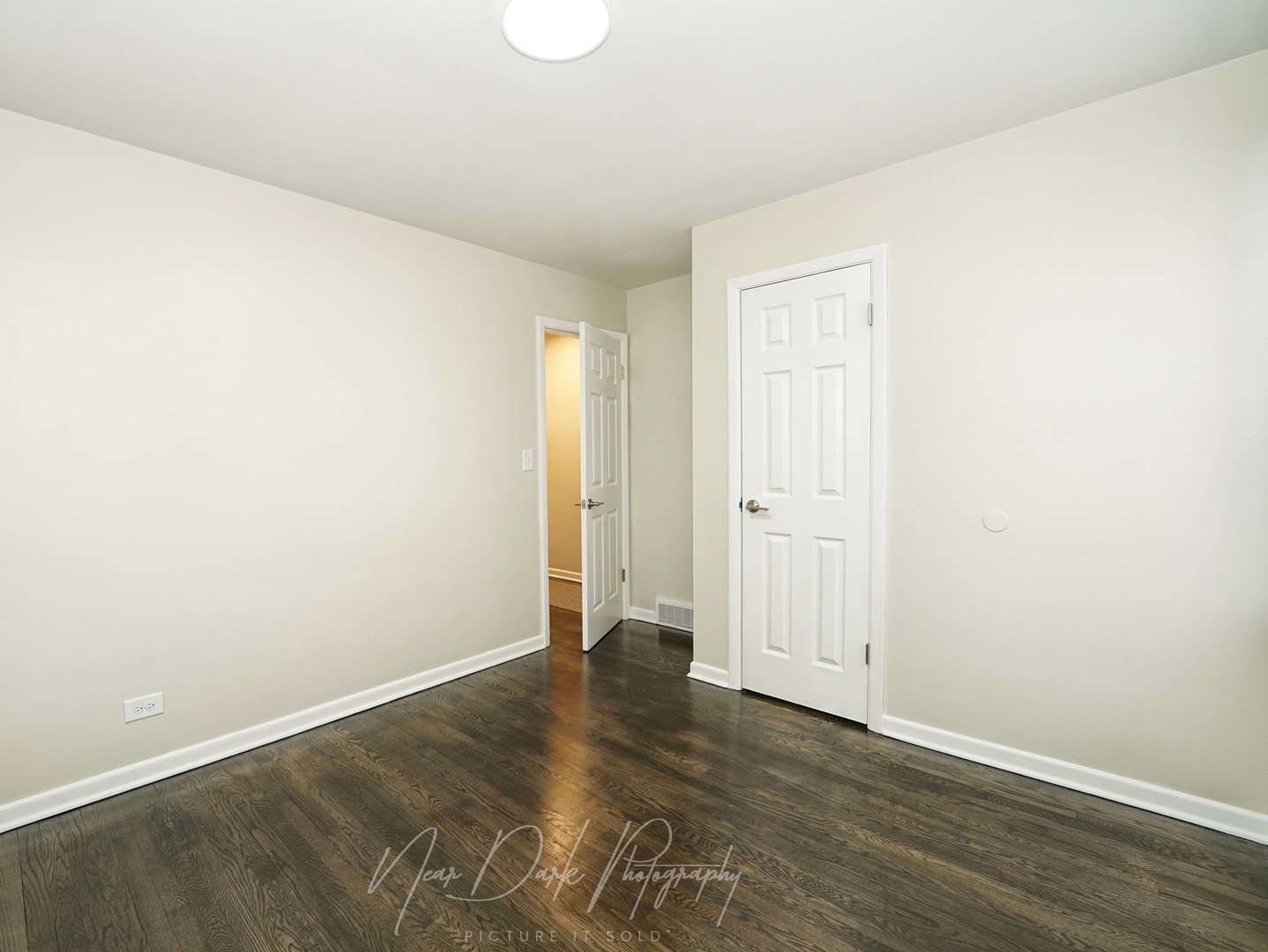 37684 North Sheridan Road Beach Park, IL 60087 - Photo 16 of 27 an empty room with wooden floor