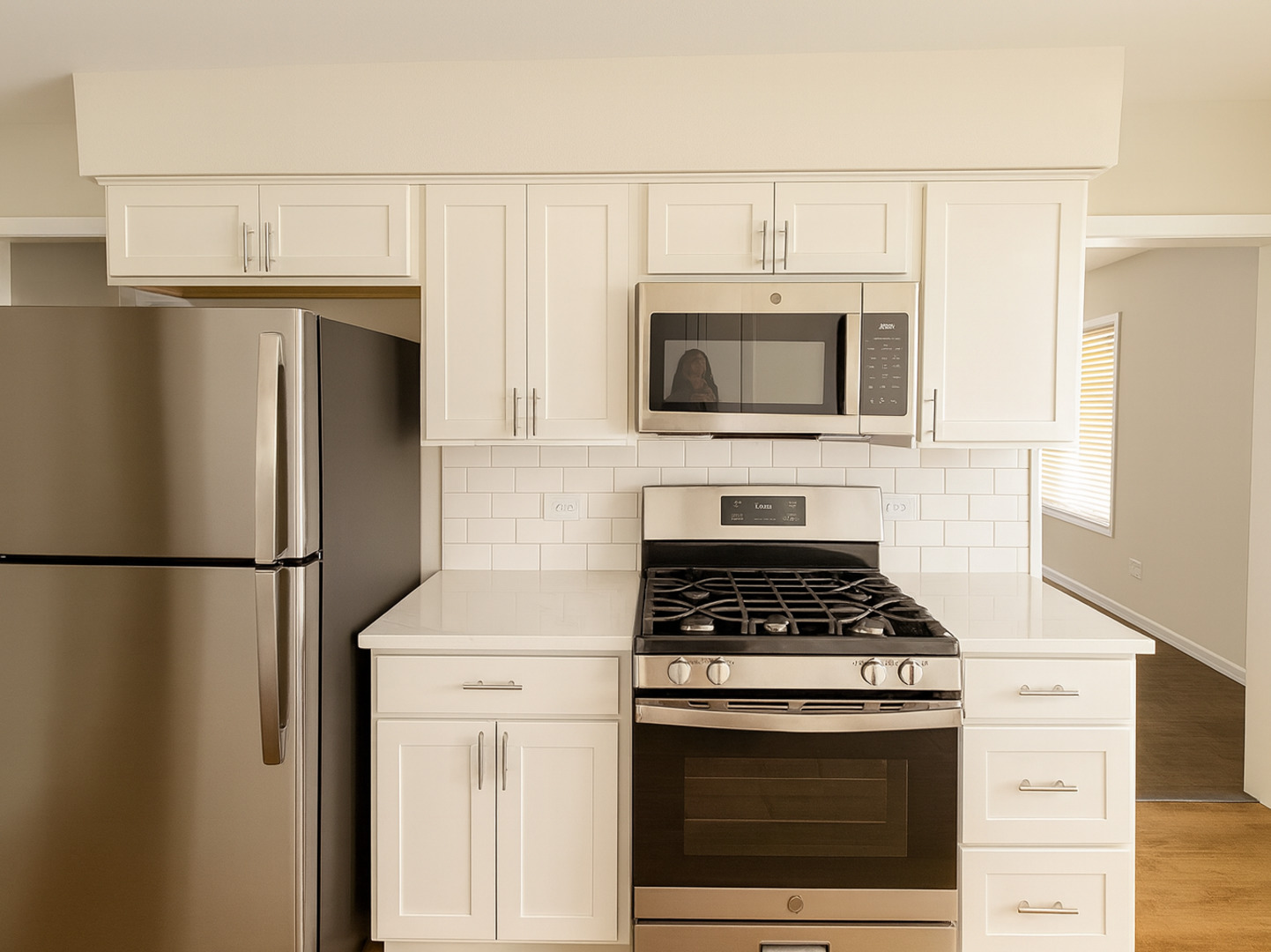 37684 North Sheridan Road Beach Park, IL 60087 - Photo 9 of 27 a kitchen with a refrigerator stove and microwave