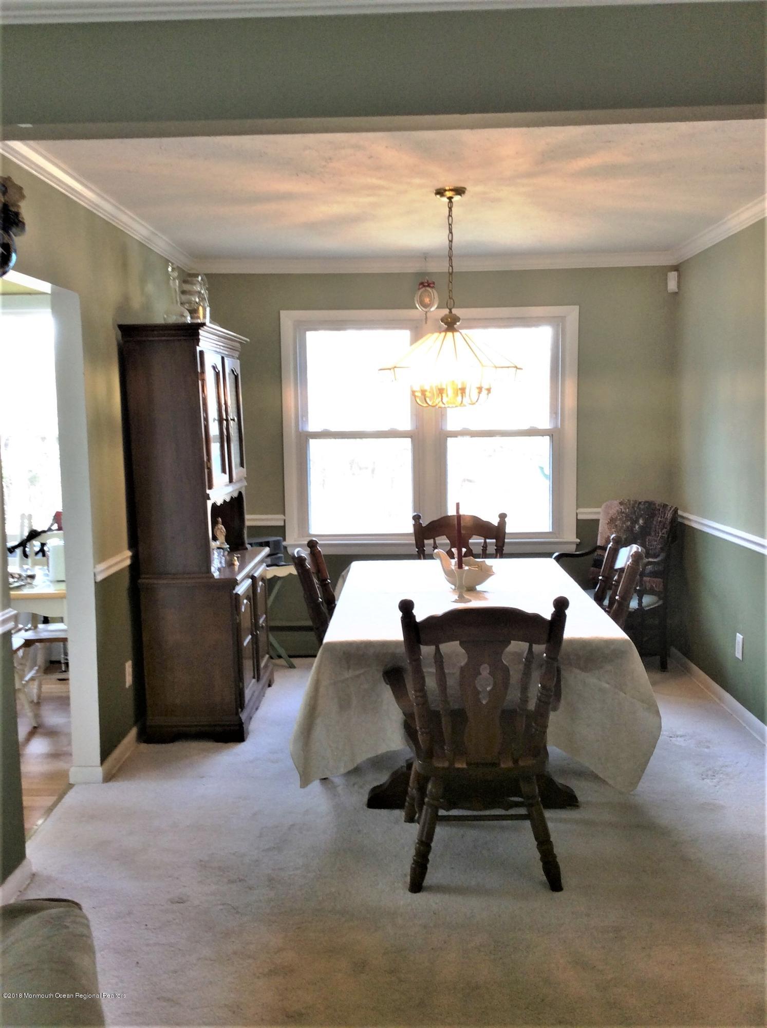 224 Old Mill Road Freehold, NJ 07728 - Photo 9 of 25 a view of a livingroom with furniture and window