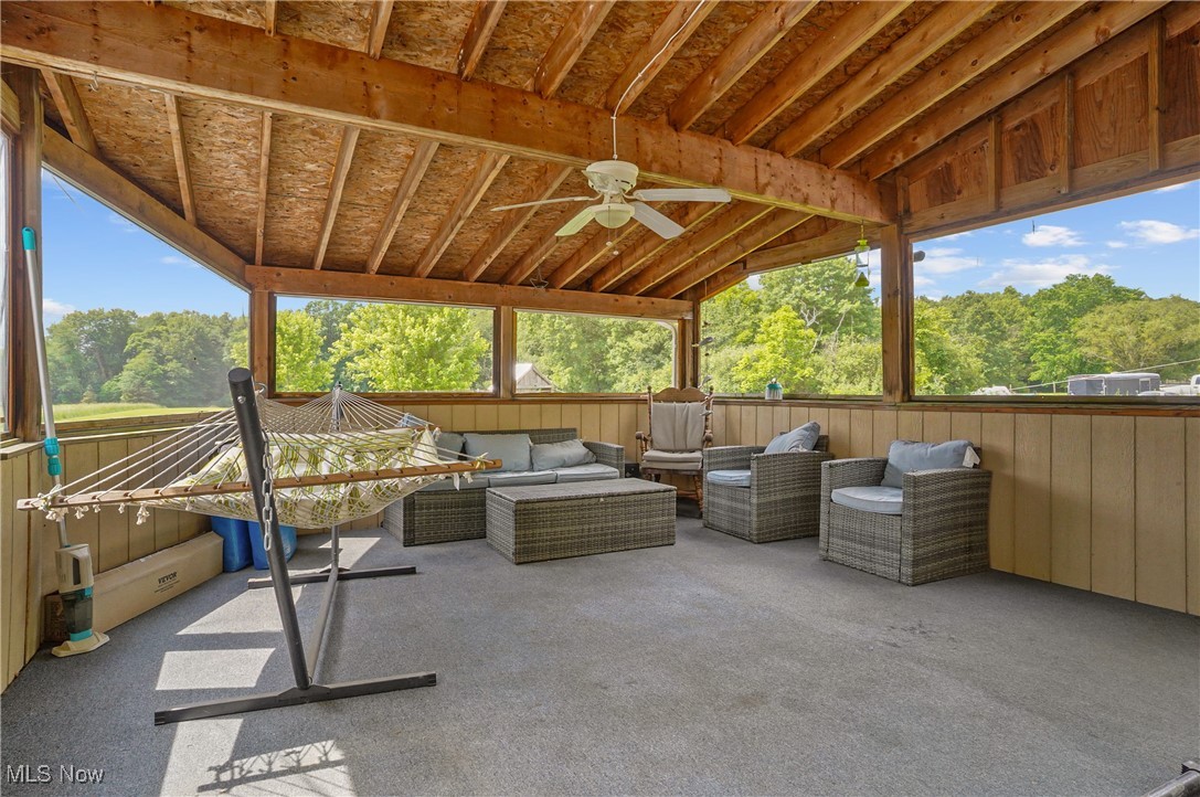 4940 Hayes Road Ravenna, OH 44266 - Photo 4 of 39 Screened in porch off kitchen complete with electric