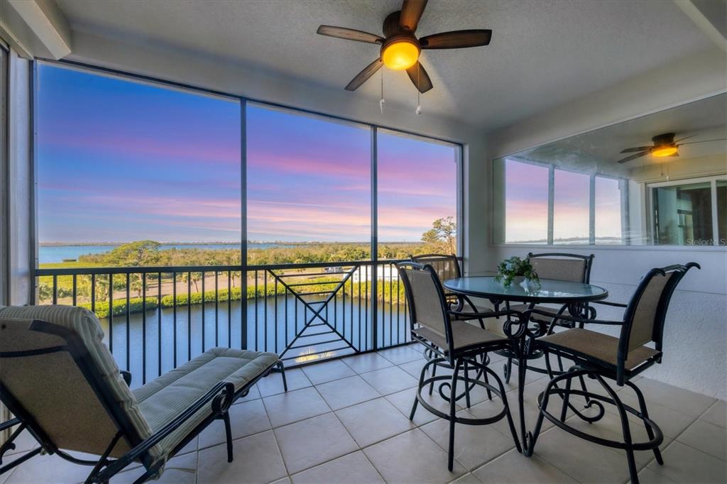 9203 Griggs Road, Unit A302 Englewood, FL 34224 - Photo 2 of 42 a view of a balcony with furniture