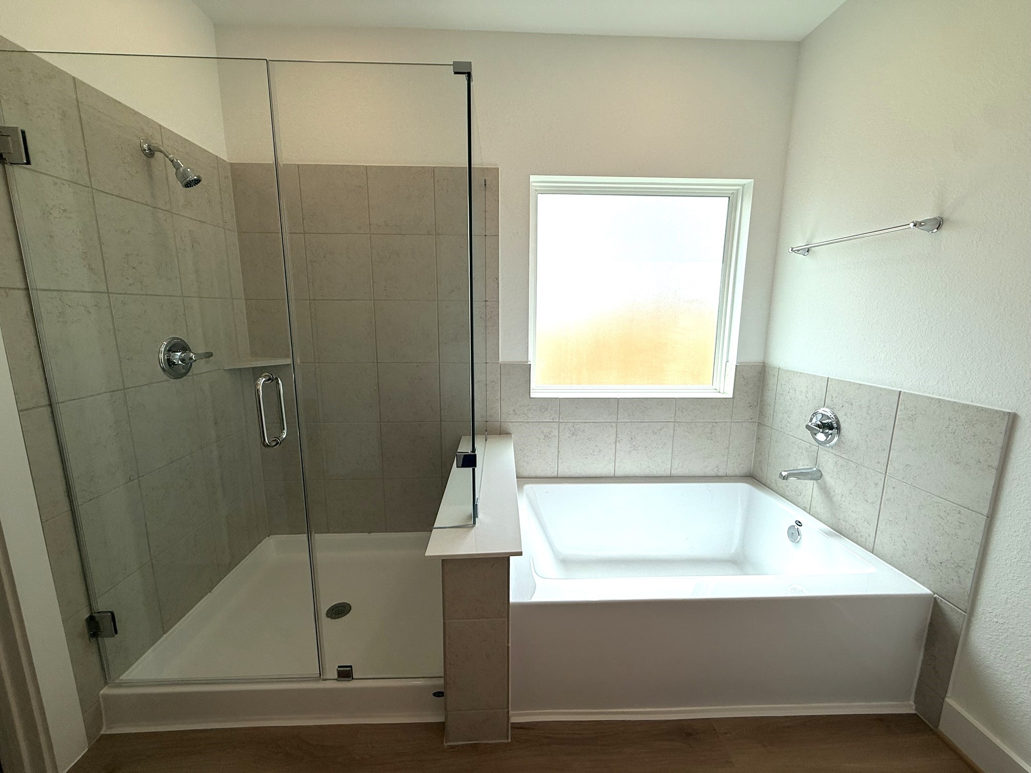 5314 Grace Sunshine Spring Spring, TX 77379 - Photo 12 of 23 Enjoy the best of both worlds with a separate soaking tub for relaxation and a walk-in glass shower for convenience.