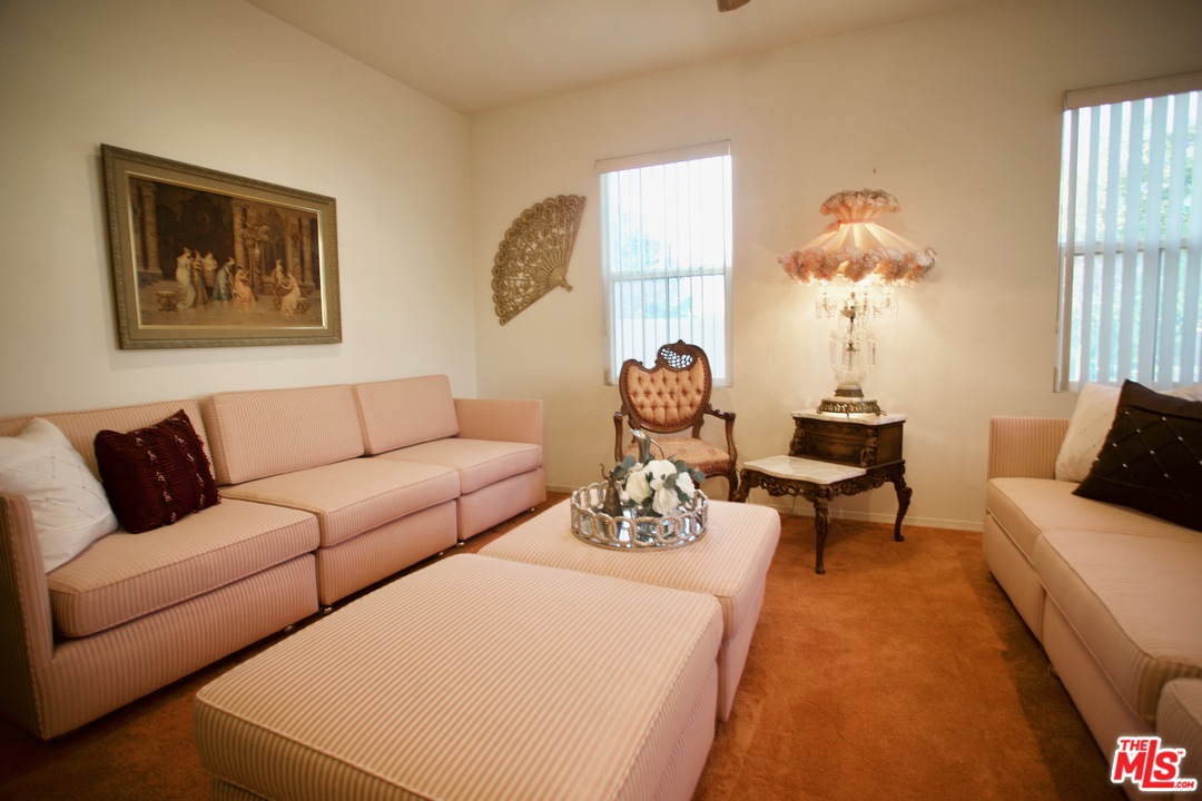 1401 Wild Olive Road Tehachapi, CA 93561 - Photo 4 of 7 a living room with furniture and a large window