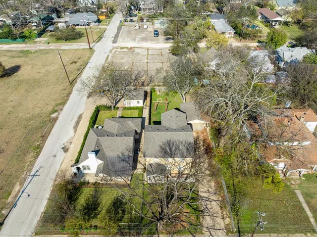 an aerial view of residential house with outdoor space