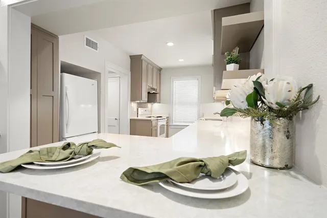 a dining room with furniture