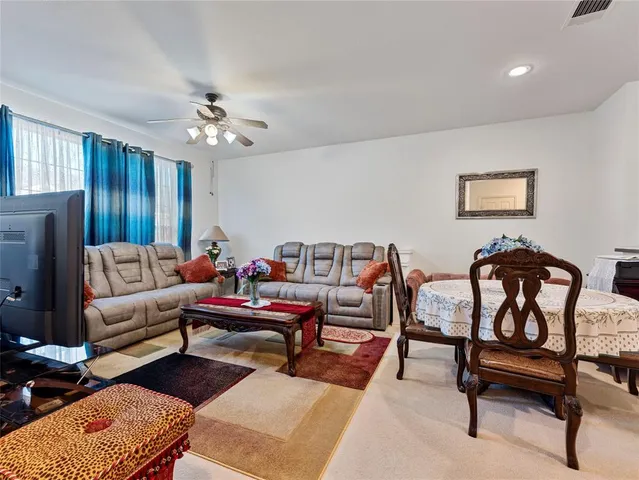 a view of a livingroom and dining room