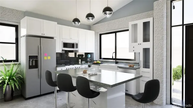 a kitchen with granite countertop a sink appliances and cabinets