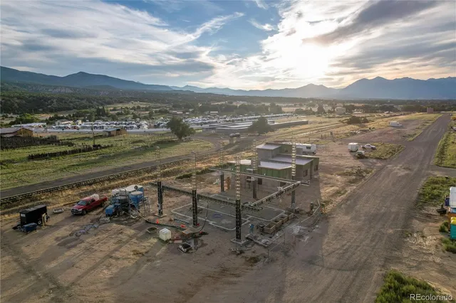 a view of an ocean and a mountain