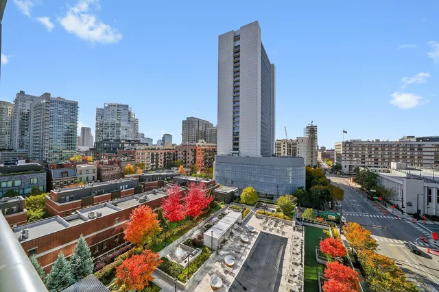 a view of a city with tall buildings