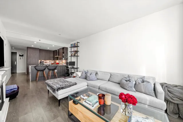 a living room with furniture and a couch