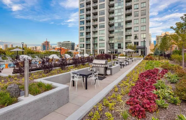 a city view with outdoor seating