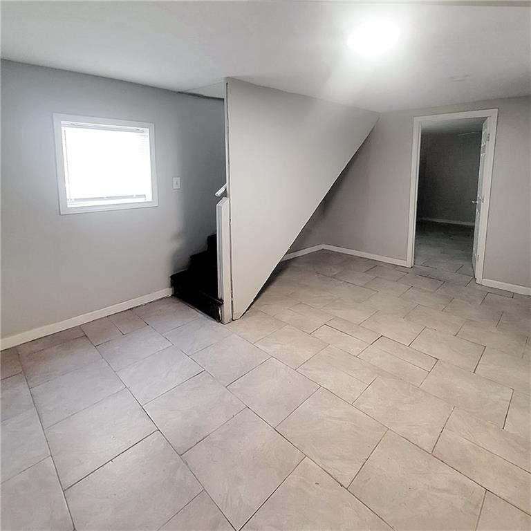 1093 Windsor Street Southwest Atlanta, GA 30310 - Photo 12 of 18 a view of an empty room and window