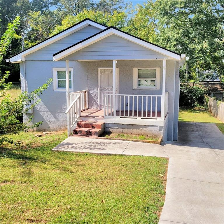1093 Windsor Street Southwest Atlanta, GA 30310 - Photo 3 of 18 a view of a house with a swimming pool