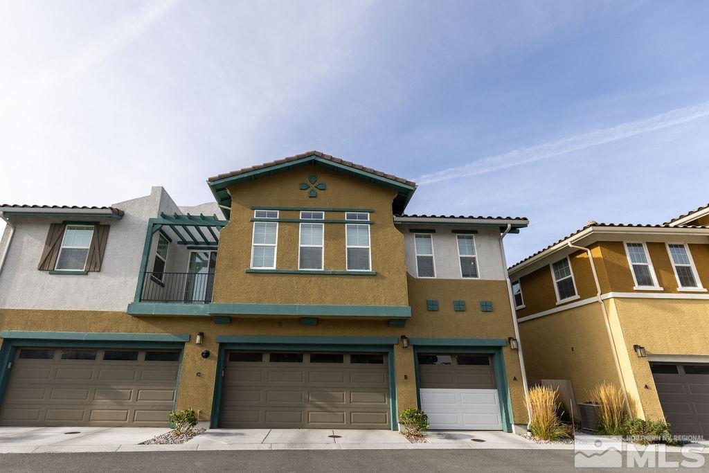 1845 Dark Horse Road, Unit B Reno, NV 89521 - Photo 17 of 25 a front view of a house with a yard