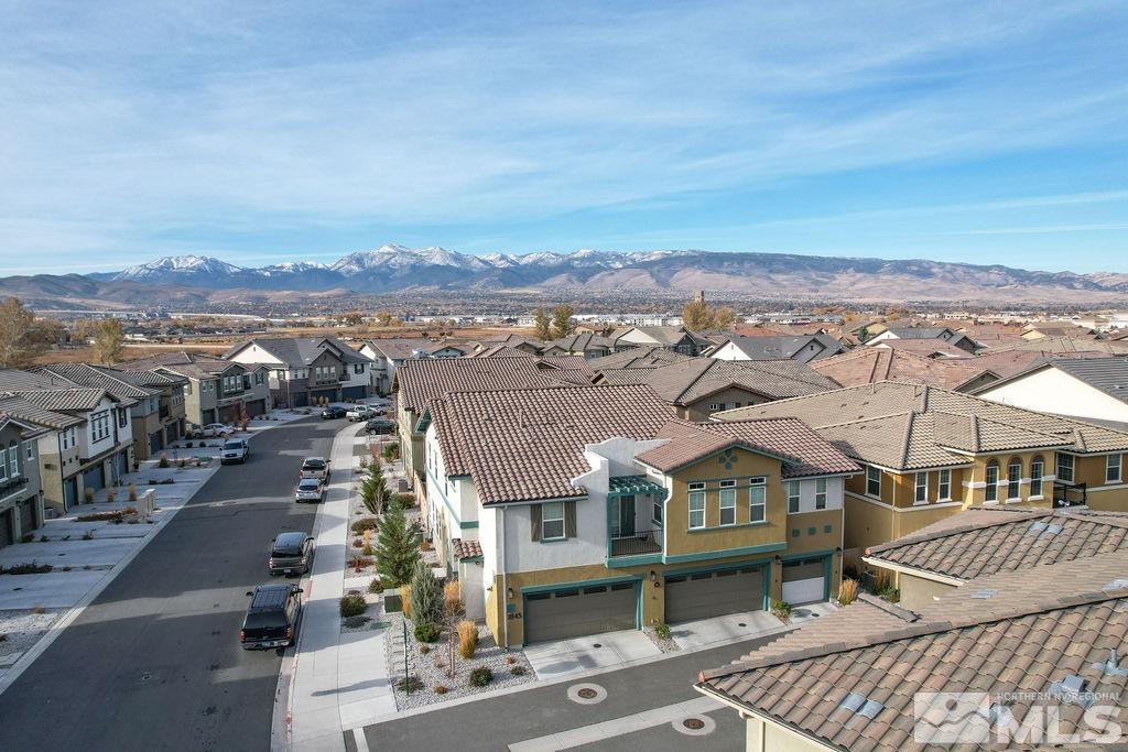 1845 Dark Horse Road, Unit B Reno, NV 89521 - Photo 24 of 25 an aerial view of residential houses with city view