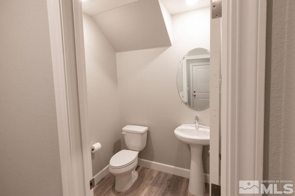 1845 Dark Horse Road, Unit B Reno, NV 89521 - Photo 5 of 25 a white toilet sitting next to a shower