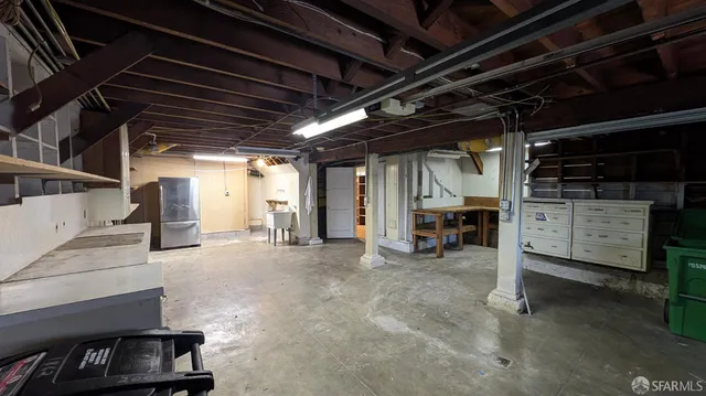 a view of an empty room with storage