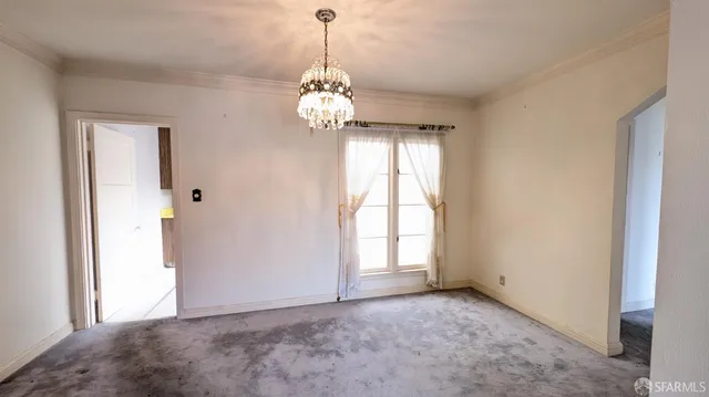 a view of a room with a chandelier