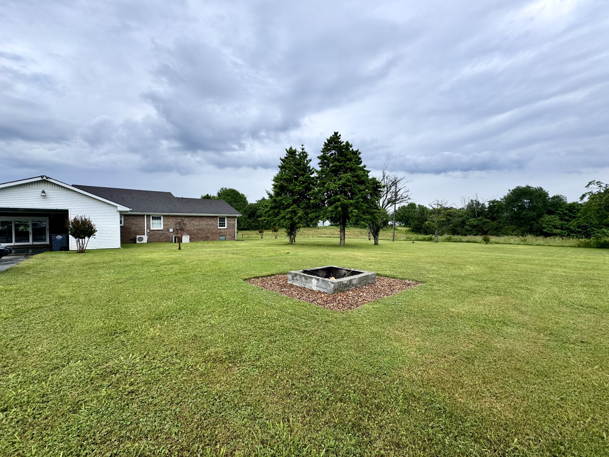 802 Days Road Lafayette, TN 37083 - Photo 3 of 25 a view of a house with a big yard