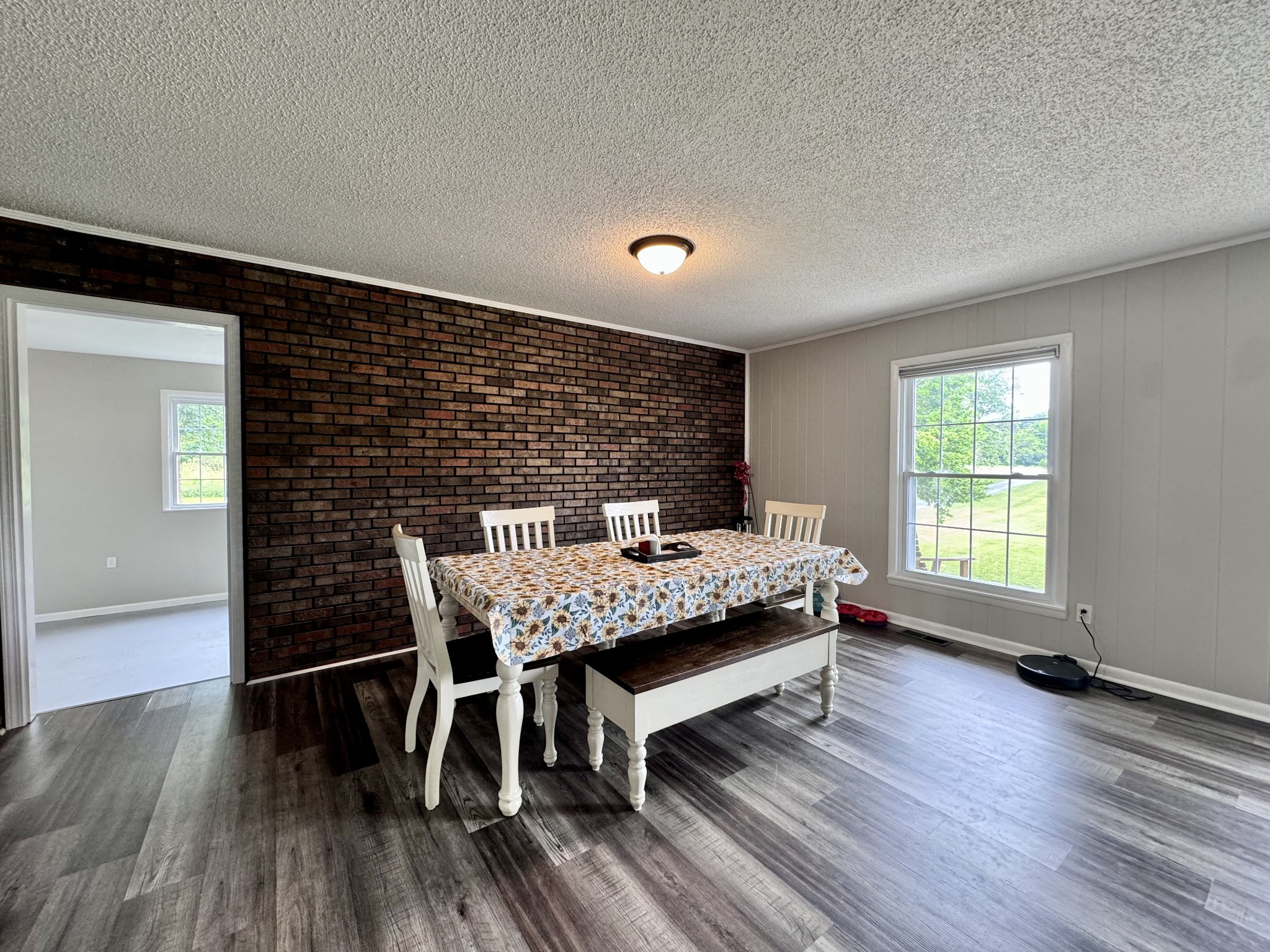 802 Days Road Lafayette, TN 37083 - Photo 8 of 25 a view of a workspace with furniture and wooden floor