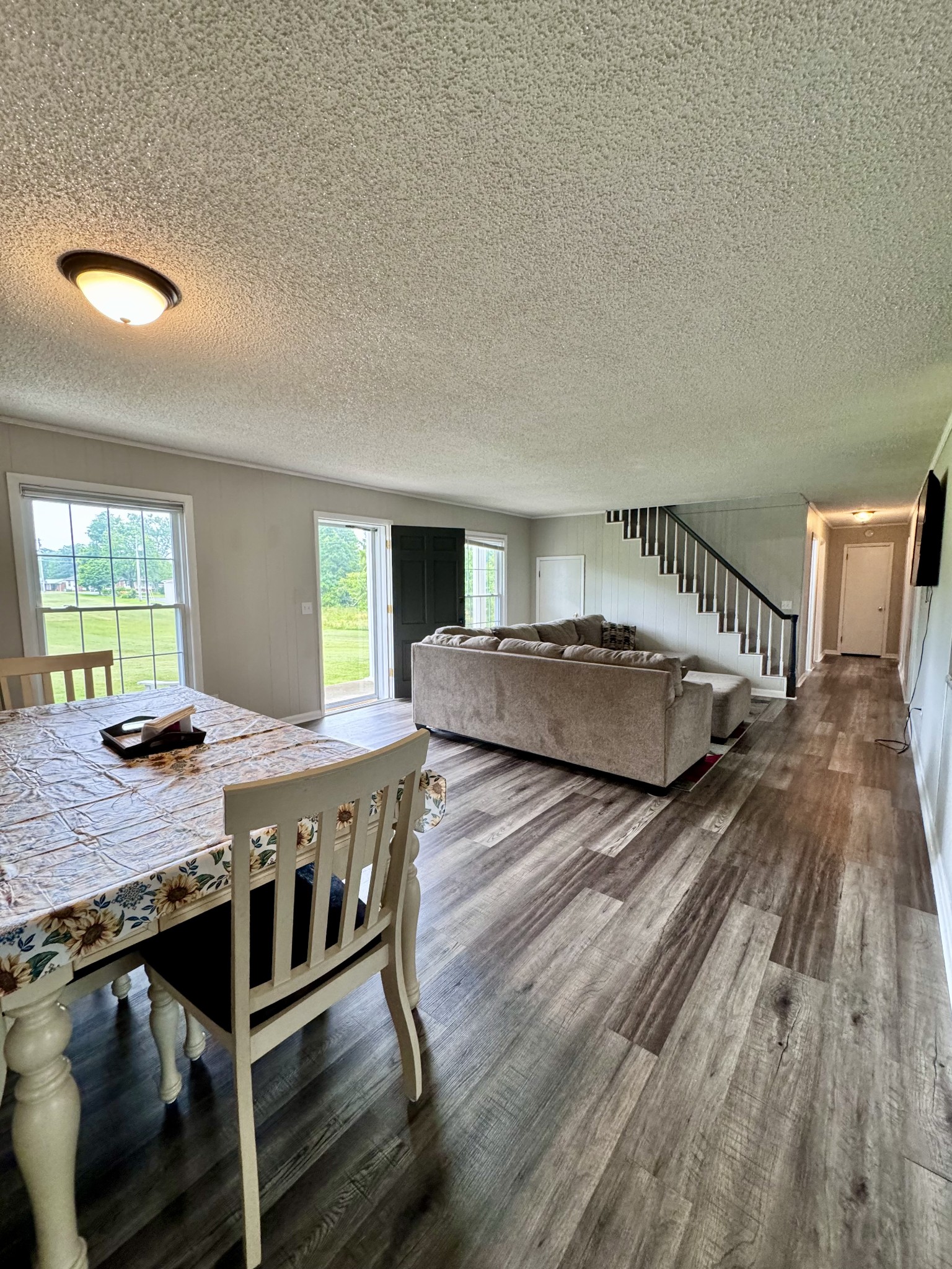 802 Days Road Lafayette, TN 37083 - Photo 9 of 25 a bedroom with a bed and a table