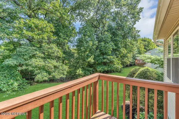 a view of a balcony with an outdoor space