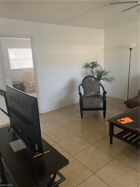 3325 Airport-Pulling Road North, Unit L1 Naples, FL 34105 - Photo 2 of 10 a living room with furniture