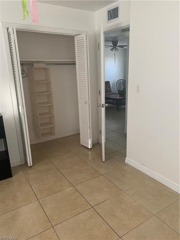 3325 Airport-Pulling Road North, Unit L1 Naples, FL 34105 - Photo 5 of 10 an empty room and a bathroom