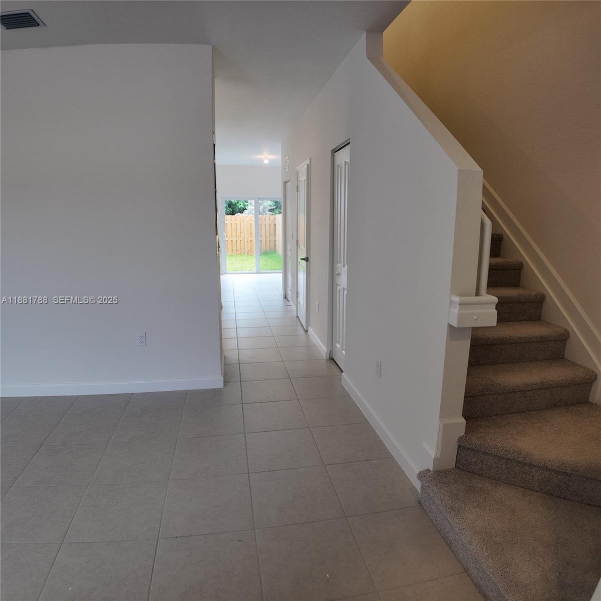 35761 Southwest 178th Court, Unit 35761 Homestead, FL 33034 - Photo 12 of 80 a view of hallway with stairs