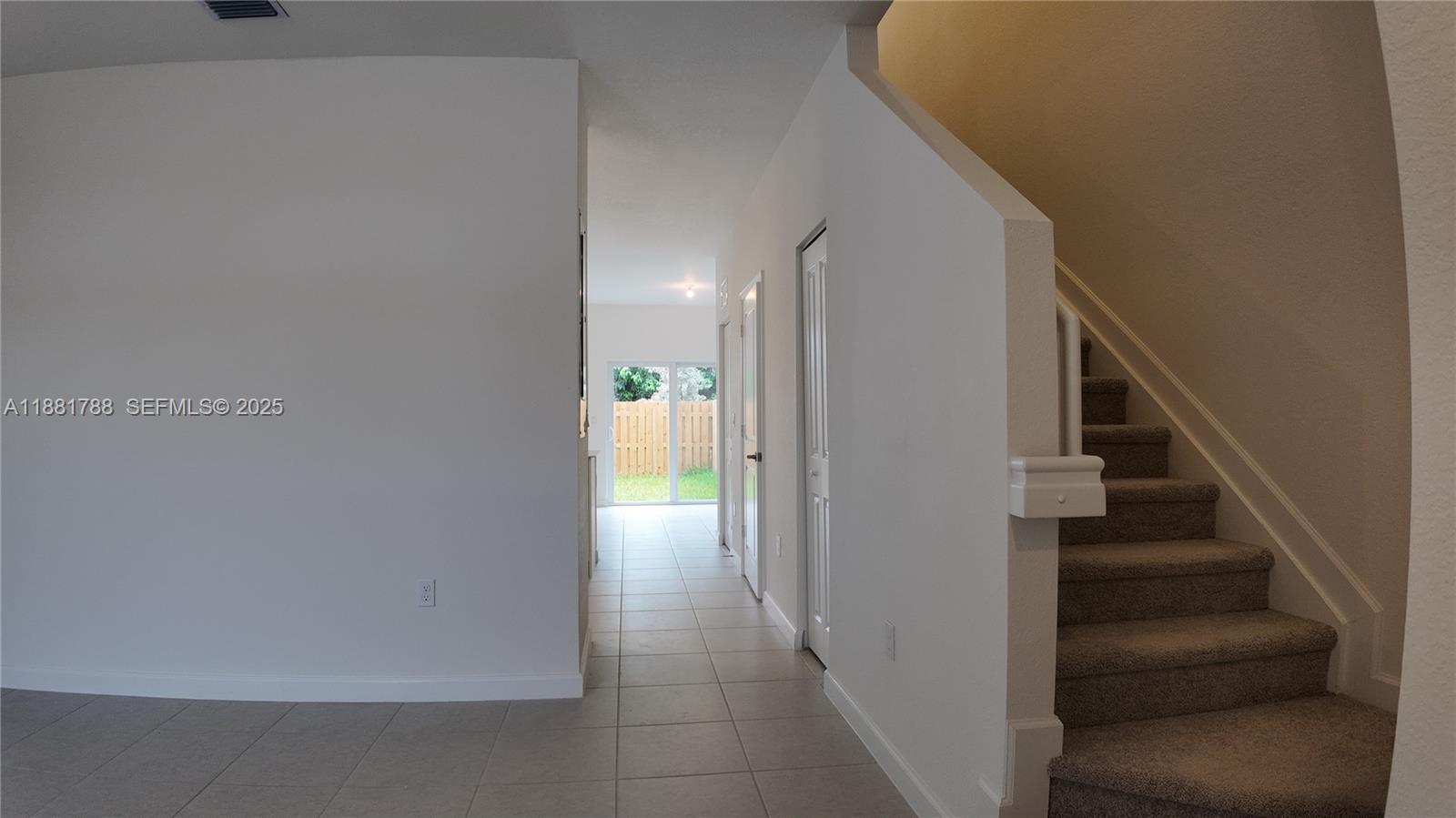 35761 Southwest 178th Court, Unit 35761 Homestead, FL 33034 - Photo 15 of 80 a view of entryway and hall