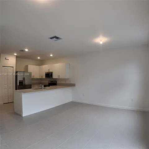 a bathroom with a sink a toilet and a bathtub