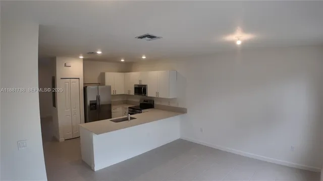 a view of hallway with closet
