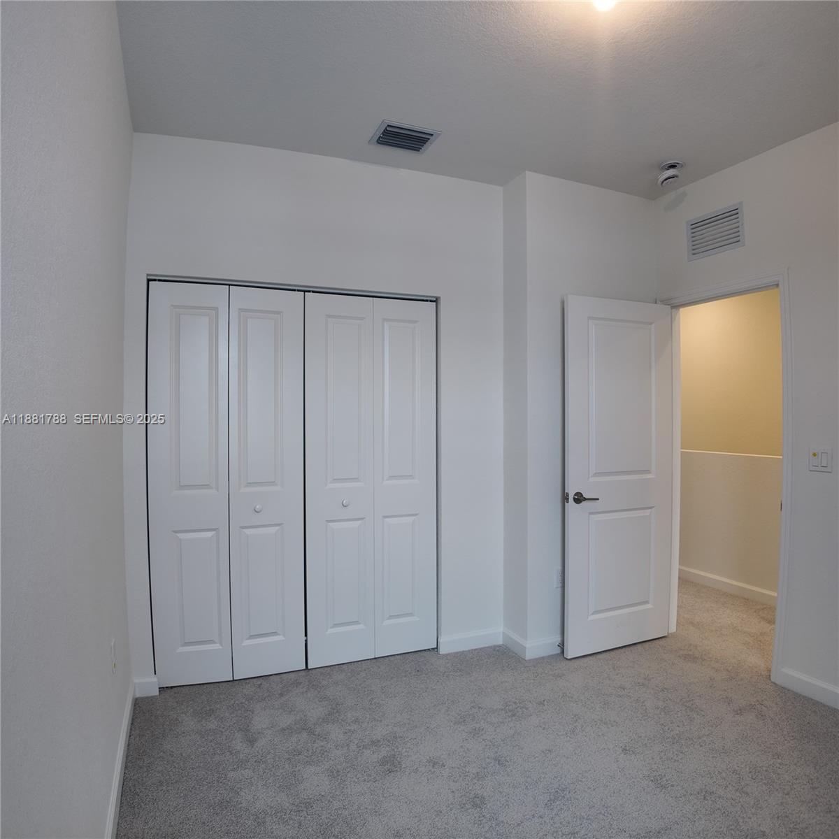 35761 Southwest 178th Court, Unit 35761 Homestead, FL 33034 - Photo 41 of 80 a view of an empty room