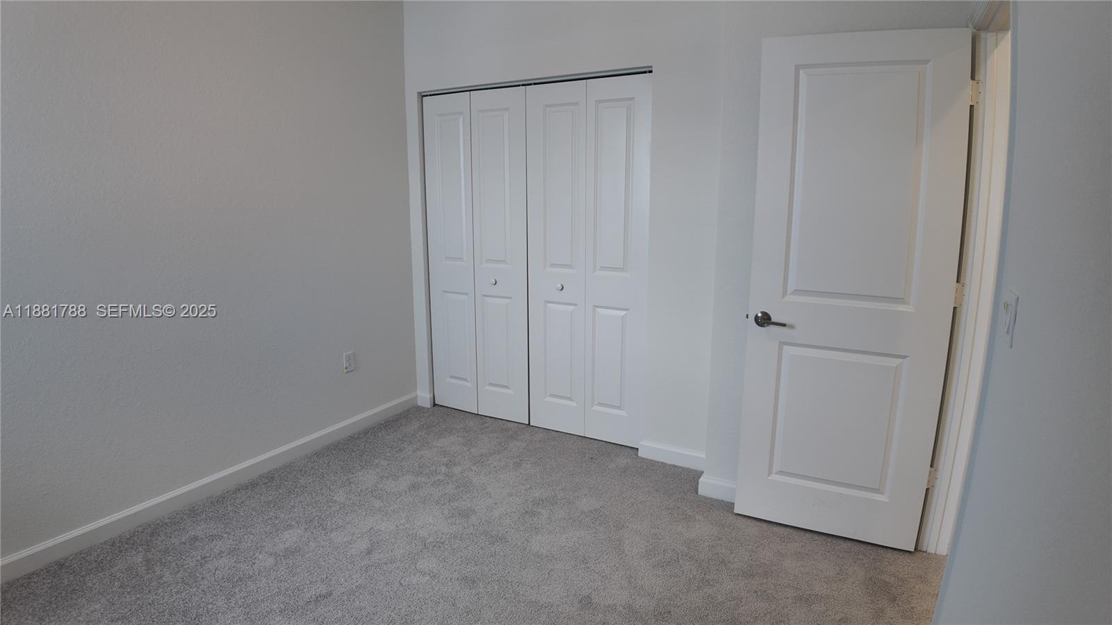 35761 Southwest 178th Court, Unit 35761 Homestead, FL 33034 - Photo 47 of 80 a view of an empty room