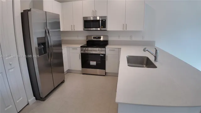 an empty room with closet area